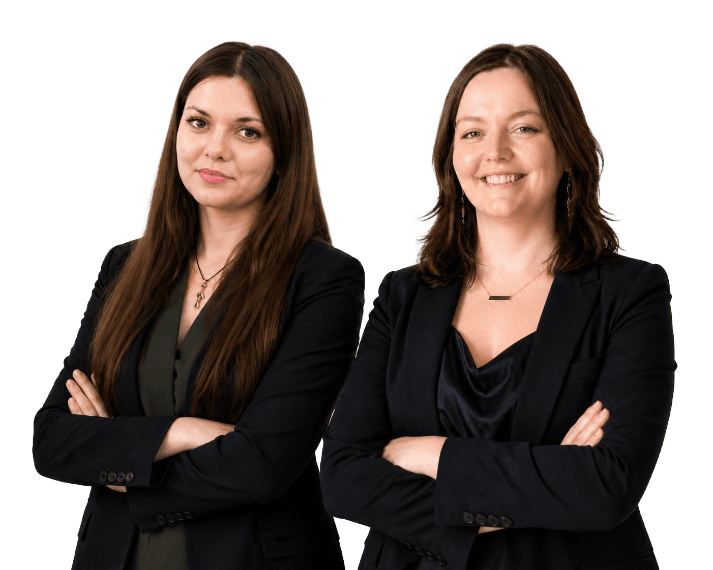 Polina Voronina and Anastasia Samsonova standing with arms crossed